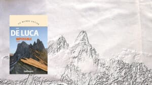 En arrière plan, les Alpes, au premier plan la couverture du livre d'Erri de Luca, Impossible