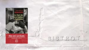 En arrière plan BISTROT en lettres, au premier plan, couverture du livre de Jean-Michel Guenassia, Le Club des Incorrigibles Optimistes